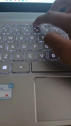 how to turn on backlit keyboard on HP laptop