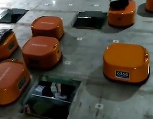 These automated, package-sorting robots are totally mesmerizing.
