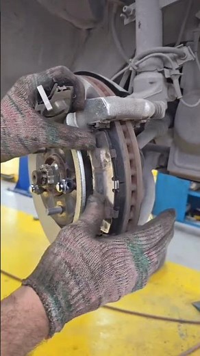 Nissan install new front brake pads #worklife #usa #mechanic #shortsfeed