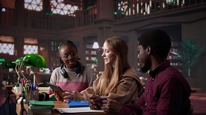 Diverse group of entrepreneurship students learning about leadership and finances for business administration skills, career focused pupils. People study taxes and accounting. Camera B.