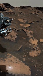 This breathtaking view from Mars shows a robotic arm carefully positioned over ancient Martian rocks, captured by NASA’s rover during its exploration of the Red Planet. 🤖🔴 The robotic arm is equipped with advanced scientific instruments designed to drill, brush, and analyze rock surfaces. These rocks are billions of years old and may hold clues about Mars’ past especially whether liquid water once existed here. #Mars #MarsMystery #mars #NASA #fblifestyle | Mars journey