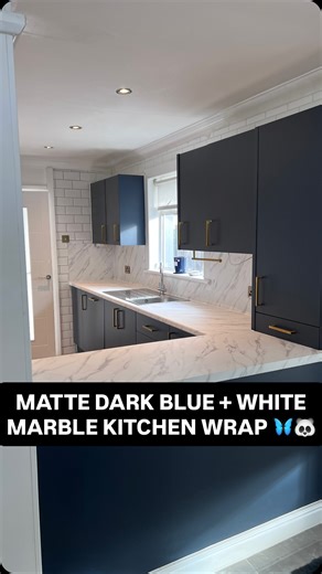 MATTE DARK BLUE WHITE MARBLE WORKTOPS KITCHEN VINYL WRAP 🦋🐼 Watch how we take this dated kitchen and turn it into a ‘showroom’. “What’s the point in getting a new kitchen, when you can just get it wrapped” our client said. She’s right. Follow us for more kitchen transformations 🫶🏼 And if you would like your kitchen wrapped, message us or visit our website for your instant free quote here: https://kitchenwrapscotland.com 🙌 #kitcheninspo #kitchenwrapscotland #kitchenwrapping #kitchenwrap #vin