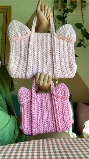 Biyabimi on Instagram: "Still working on this crochet laptop case bag pattern. It grew into something more complex, so I want to take my time to make it well. I’ll show you the upgraded version soon 🥰 #crochet #laptopcase #crochetbag #pink"