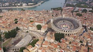 Panorama of ancient town Arles with old roman arena in Provence and Cote d'Azur, France