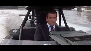 THE WORLD IS NOT ENOUGH opens with the longest pre-credit sequence in 007 history, lasting 14 minutes and includes Bond in the Q Boat in high speed pursuit down the Thames. The boat’s mid-air barrel roll was performed by stuntman Gary Powell using Vickers air mortars attached to the side of the boat — six cameras captured the stunt. | James Bond 007