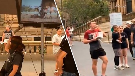Man eats KFC in front of vegan activist group