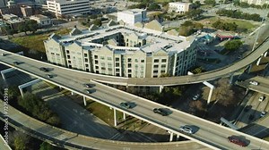 Establishing Houston Downtown Drone Shot 2024. Aerial Drone Fly Above Car Traffic of Houston Downtown at the huge intersection of I45 and I69, Cityscape Skyline