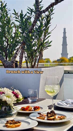 Neetu Suri | Luxury Storyteller ✨ on Instagram: "Brunch with a Qutub view? Yes, please. ✨ Slow Sundays feel different at @mipiaci.india — where Italian elegance meets one of Delhi’s most iconic skylines. From sunlit interiors and a rooftop that steals your heart, to live grills, handcrafted pizzas, fresh pastas and a live tiramisu served at your table — this is brunch done the slow, beautiful way. Come for the view. Stay for the vibe. And leave already planning your next Sunday 🥂🇮🇹 📍 Mi Piac
