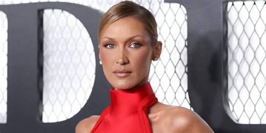 Bella Hadid Turns Heads in a Red Hot, Nipple-Baring Dress That May Come With a Hidden Meaning