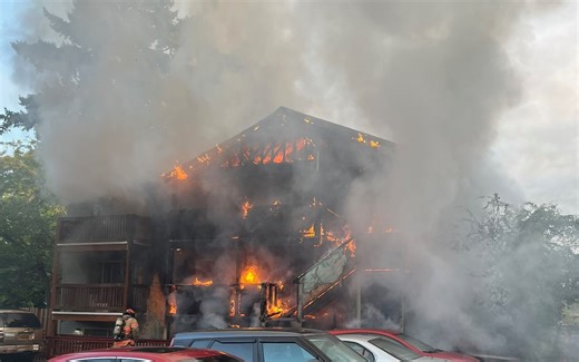 Large fire destroys apartment building in east Portland, 2 people rescued
