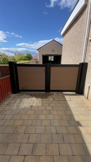 Durable Teak Composite Driveway Gates Installed