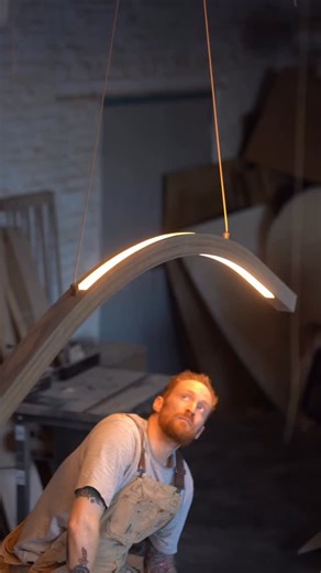 ovuud on Instagram: "curve adjustment . . quick assembly of the newest 8’ arc hanging light - showcasing the dual light face and updated hardware + brightness. . #sculpturallighting #modernlighting #buildingprocess"