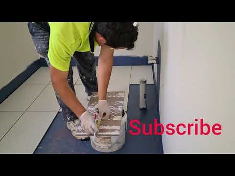 how to tile laundry floor