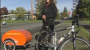 Nurse making house calls on two wheels