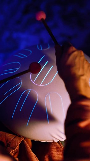 One tongue drum is good — but with a jacket and light, it’s pure cosmos. | Kosmosky Tank drum