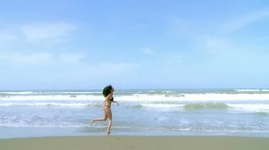 Happy Female Model Running Out Water Stock Footage Video (100% Royalty-free) 6914701 | Shutterstock