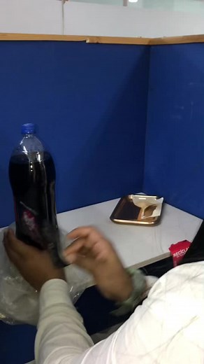 Unwrapping Coca-Cola Original Taste in Break Room Setting