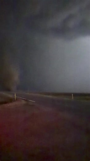 Nighttime Tornado Surprise for Storm Chaser
