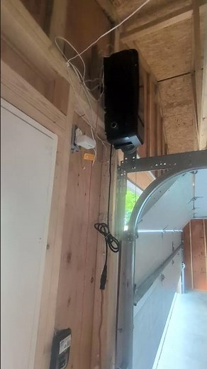 Chamberlain RJ0101 low overhead room kit and reverse wound drum works just fine.