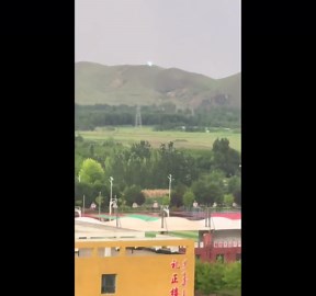 China: Mysterious Glowing Orb Captured Over Mountains After Storm in Inner Mongolia