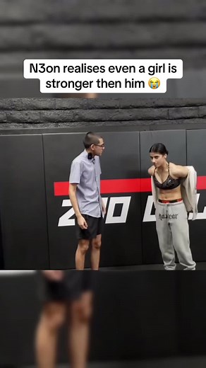 Girl's Strength Surpasses Weak Male in Wrestling Showdown