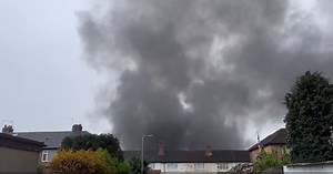 Smoke coming from fire at Aintree Industrial Park