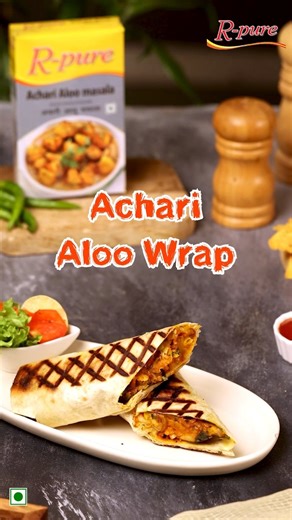 Spice up your snack game with a zesty twist! 🌯✨ Indulge in the irresistible flavors of Achari Aloo Wrap, perfectly seasoned with R-Pure Achari Aloo Masala. Taste the magic in every bite! Note- Product images are for illustrative purposes only and does not represent its true nature. Disclaimer: spices used are intended for culinary use only. Any other application is not recommended. #RPure #AchariAlooWrap #RecipeOfTheDay #SpiceItUp #FoodieDelight #QuickEats #TangyTreat #FlavorExplosion #IndianCu