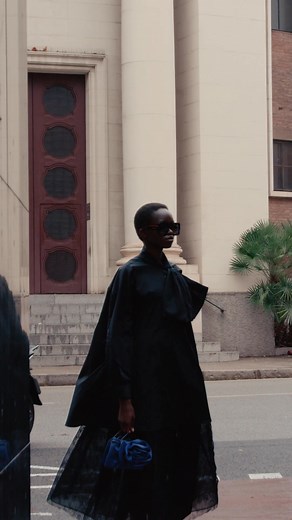 As part of the Fall 25 Eyewear Collection, Anyer Anei wears square sunglasses in Havana with brown shaded lenses from the House of Herrera line. #HerreraEyewear