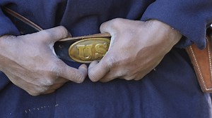 Black soldiers are honored, name by name, at a Civil War battlefield