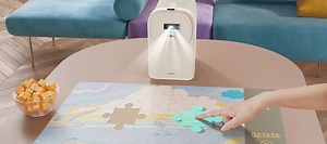 Samsung nya projektor går att använda som pekskärm. Premiere 5 kan även användas för att visa film.