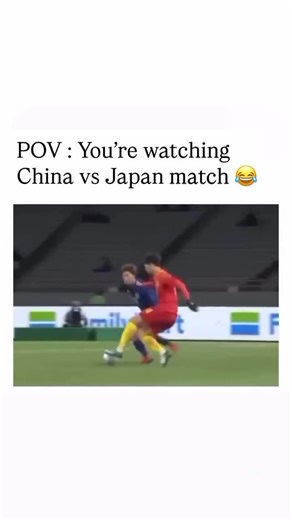 DAR CITY on Instagram: "😂😂😂😂😂 This reel, captioned “POV: You’re watching China vs Japan match,” shows a football clip where a Japanese player in blue (number 12) skillfully dribbles the ball past multiple Chinese defenders in red, one after another, in a continuous run toward the goal. Instead of game commentary, the audio is a comically rapid-fire voiceover reciting a long, rhythmic list of what sound like Chinese names. The video’s humor and core point stem from this audio-visual juxtapos