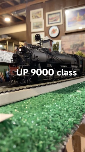 Ho scale model Union Pacific 9000 class departing the station