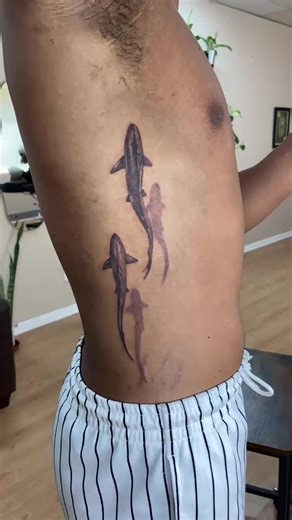 Stunning Shark Tattoos on Ribs by Zayd