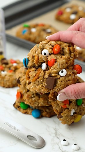 Edible Eyeballs are the perfect spooky season addition to these kitchen sink monster cookies! Easy to whip up from scratch with ingredients you already have in your cupboard: https://bit.ly/KitchenSinkMonsterCookies 🥣🎃🍪👀 What other mix in's would you add? | Wilton Cake Decorating