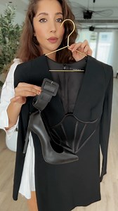 Date night ready! Here's @chloewidera putting together an all-black date night look with a Versace dress, Saint Laurent heels, a Jacquemus mini bag, and Bvlgari jewelry. Just gorgeous! #datenight #grwm #luxury #allblackoutfit #outfitinspo | The Luxury Closet