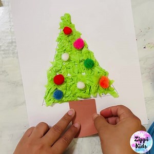 A super hands-on fine motor Christmas Tree Craft for preschool and kindergarten 🌲🎄🌲...This crumbled paper Christmas tree is a must do December craft for your little ones🎄🌲🎄 #christmas #tree #craft #finemotor https://zippikids.com/blog/25-easy-christmas-crafts--activities-for-preschool-pre-k-and-kindergarten | Zippi Kids Corner