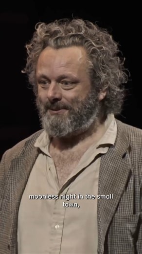 National Theatre on Instagram: "'You can hear the dew falling, and the hushed town breathing.' 💛 Michael Sheen breathes new life into the opening speech of Dylan Thomas’ poetic masterpiece. Under Milk Wood is streaming now on National Theatre at Home. Head to the link in our bio to watch the full play 👆 #MichaelSheen #UnderMilkWood #DylanThomas #NationalTheatreAtHome"