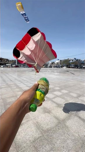 Flying a kite with a string made from a water bottle cap, the kite almost fell to the ground... #...