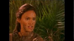 Sydney Fox (Tia Carrere) mud fight followed by a quick shower