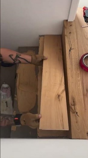 The process of installing wood to cover concrete stairs#shorts