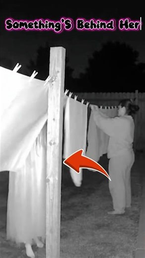 Night Vision Camera captures Strange Figure Hiding by the Clothesline #americashorts #horrorshorts