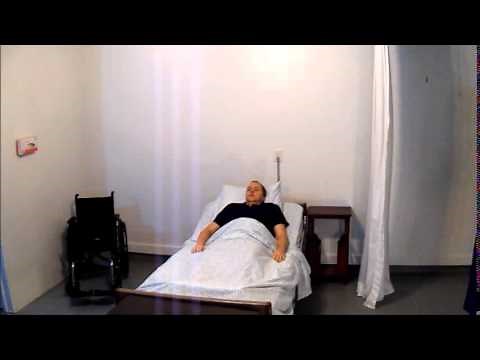 Transfer the resident from the bed into a wheelchair using a pivot technique and a