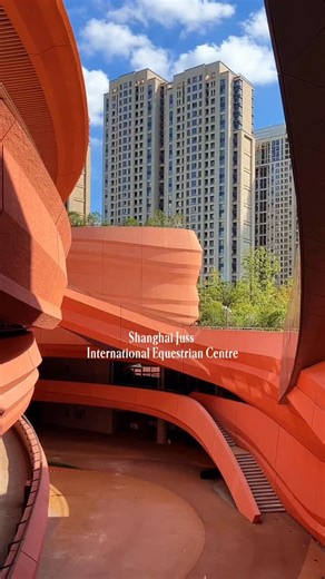 Art of Travel Japan on Instagram: "Opened in May 2024, Shanghai Juss International Equestrian Centre is a 3.32 hectare venue inside Pudong’s Expo Culture Park and China’s first permanent facility built to international five-star equestrian competition standards. Developed by Shanghai Juss Sports Development (Group) Co., Ltd., the design was delivered through a collaborative process led by Arcplus Group. The layout centres on a 90 × 60 m competition arena, warm-up and training fields, stables, ve