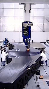 Giant Composite Aerospace Part Manufacturing This machine is the Mongoose Hybrid from Ingersoll Machine Tools. It is an AFPM, Automatic Fiber Placement Machine. Mongoose Hybrid can fiber-place, tape-lay, and inspect a wide variety of carbon fiber materials from the most common to the most challenging, including epoxies, BMI, thermoplastics, carbon fiber, glass fiber, and more. This is an appreciation post highlighting a manufacturing process that you might not have seen before. Video Credit: Ing