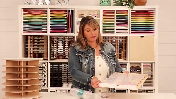 ORGANIZE YOUR EMBELLISHMENTS As paper crafters, we love embellishments! They add that extra pizazz to your scrapbook pages, create fun shaker cards, and add texture to those mixed media projects. However, organizing embellishments can be tricky. They come in different-sized jars and containers and are thrown in a drawer or bin, where they are often forgotten. In our latest video, Michelle dives in to share how Crafty Storage Jars are the perfect solution for organizing those embellishments. She 