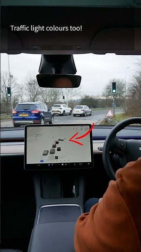 Tesla Model Y on-screen visualisations on a roundabout (HW3 in the UK)