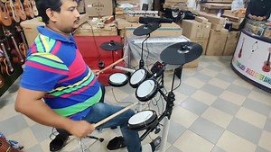 Donner DED 80 V Drum Price: 55,000 TK ￼[Authentic Playing Feel＆ Skill Building Essential Tools] Donner DED-80 electric drum set specially designed for beginners. Built-in 180 sounds＆15 drum kits, with 30 demo songs covering multiple music styles. The training and recording functions of electronic drums will allow beginners to improve their playing skills and enjoy every note! ￼[Rugged & Durable Pedal] Donner developed a new structure pedal, which is comfortable and durable, the lightweight desig