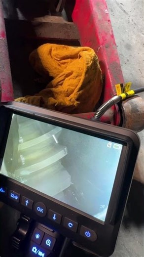 Front diff with broken pinion teeth. Using borescope camera