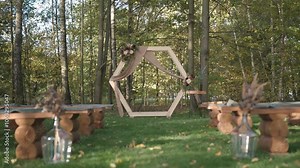 Wedding altar and triumphal arch waiting for guests and wedding guests in autumn nature. Traditional country wedding. Europe, Czech Republic