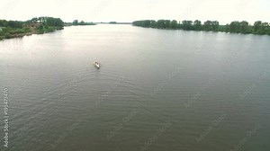 Rowing and Canoeing. The view from the drone on the river swimming athletes Aerial